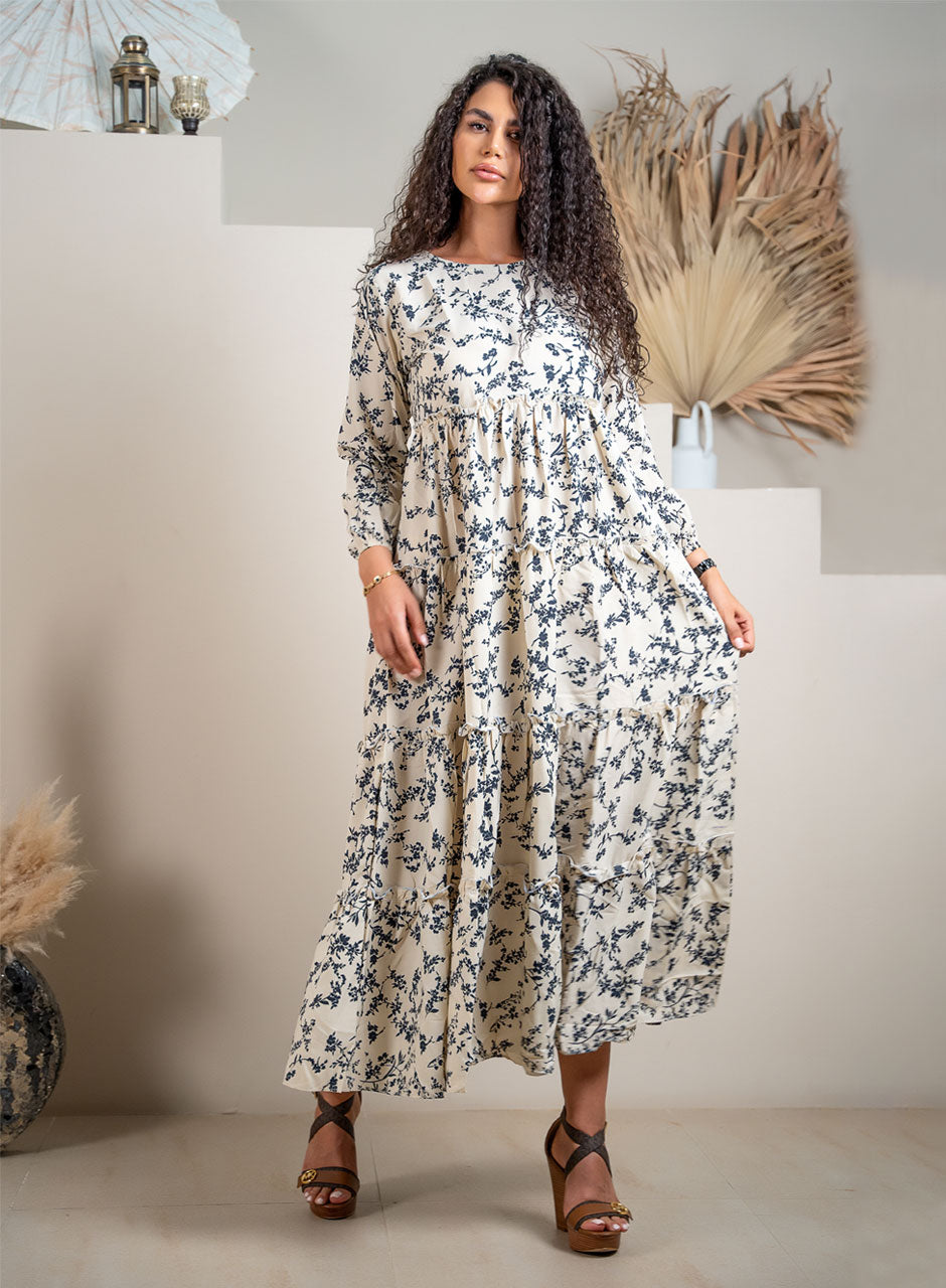 Whispering Petals Tiered Maxi Dress: A Floral Symphony