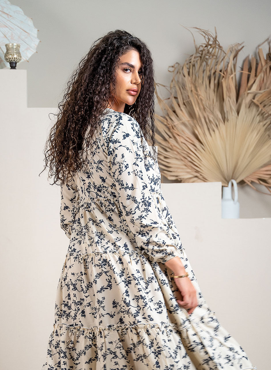Whispering Petals Tiered Maxi Dress: A Floral Symphony